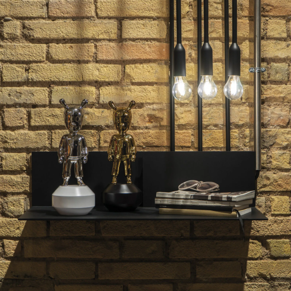 The Golden Guest Figurine.